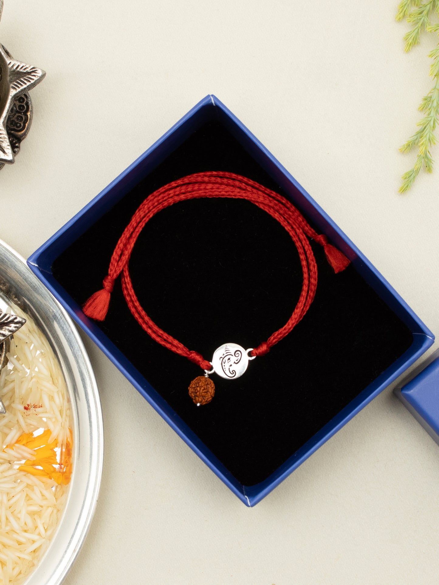 Meenakari Small Ganesha Coin with Rudraksha Sterling Silver Rakhi set with Roli Chawal and greeting card