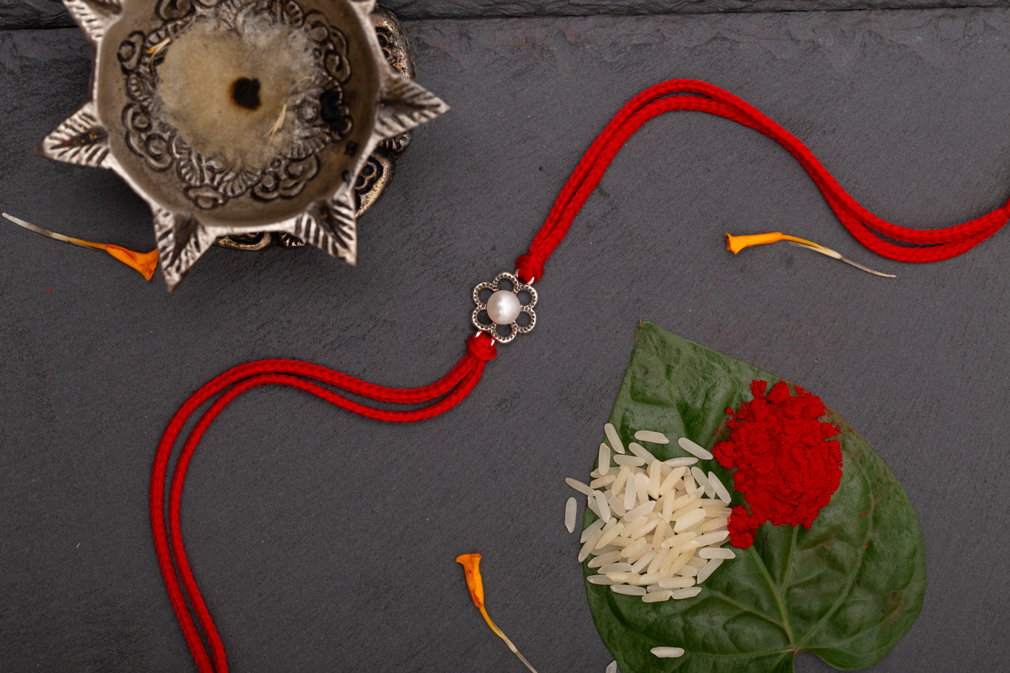 Meenakari Floral Pearl (Moti) Sterling Silver Rakhi set with Roli Chawal and Rakshabandhan Greeting Card