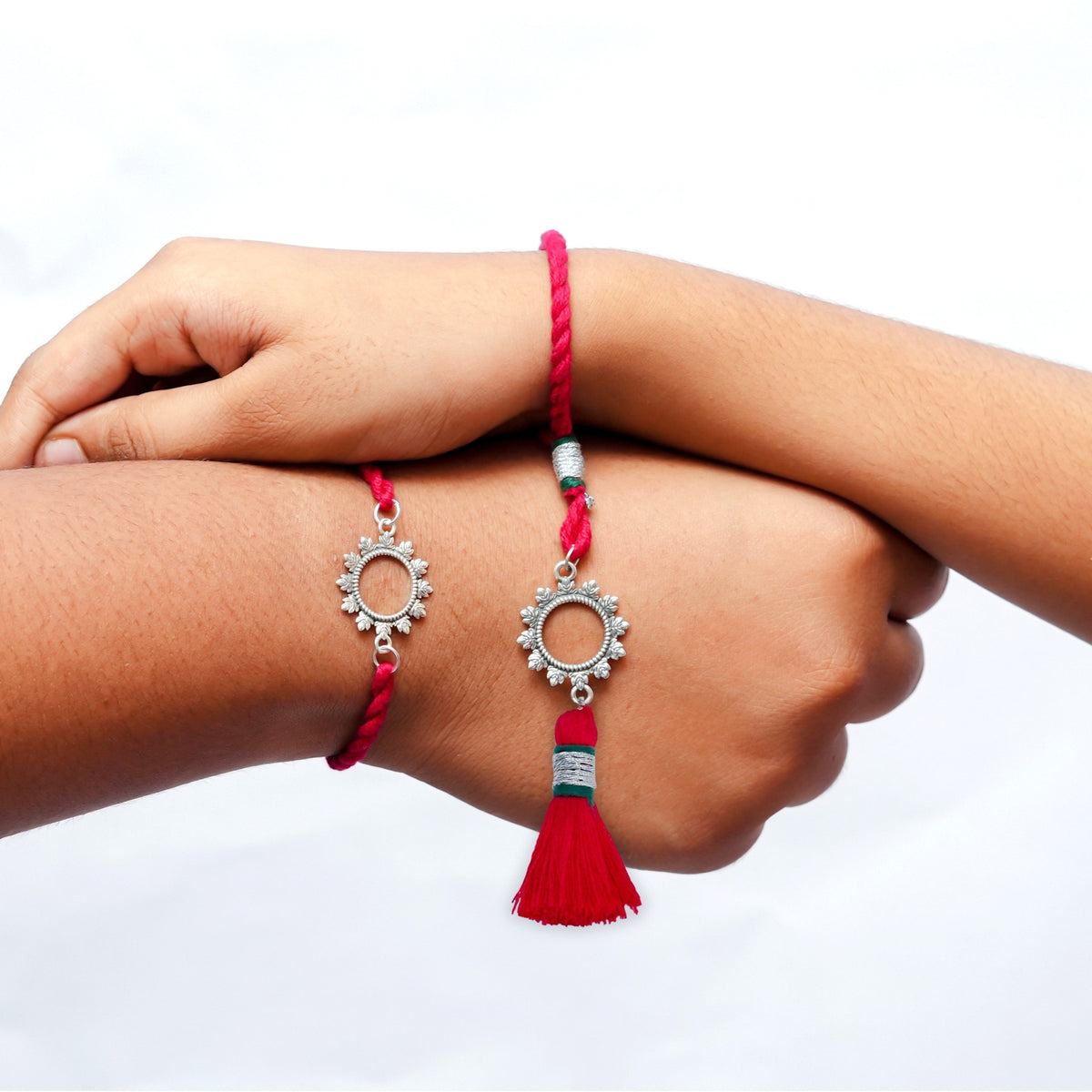 Matching floral rakhi and lumba tied on two wrists